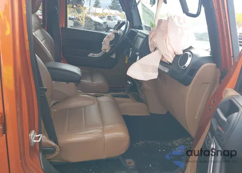 2011 Jeep Wrangler Unlimited Sahara from USA, damaged, VIN 1J4BA5H12BL600515